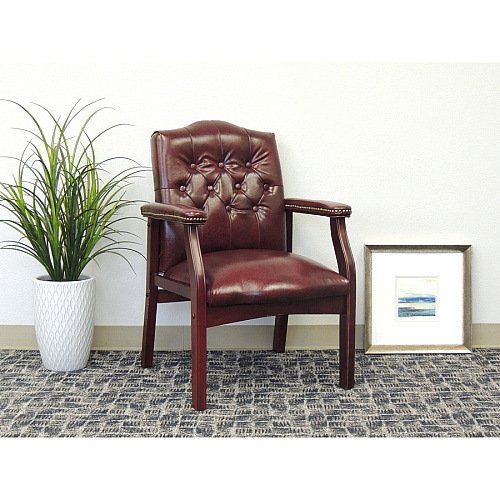 Boss Traditional Oxblood Vinyl Guest Chair with Mahogany Finish Burgundy Seat Color - Vinyl Seat Material - Burgundy Back Color - Vinyl Back Material - Mahogany Frame Color - Four-legged Base - 1 Each (B959BY)