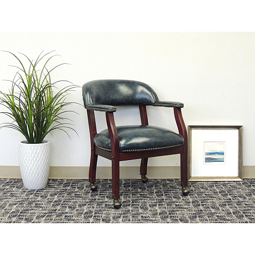 Boss Captain's Chair In Blue Vinyl with Casters Blue Seat Color - Vinyl Seat Material - Blue Back Color - Vinyl Back Material - Mahogany Frame Color - Hardwood Frame Material - Four-legged Base - 1 Each (B9545BE)