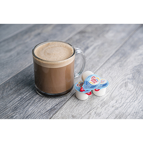 Coffee-mate Coffee mate Coconut Creme Creamer Singles Coconut Creme Flavor - 0.38 fl oz (11 mL) - 4/Carton - 50 Per Box - 1 Serving (43597CT)